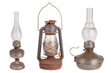 Three antique kerosene lamps isolated on white background