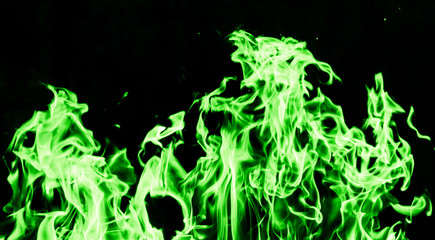 green flame fire on black background