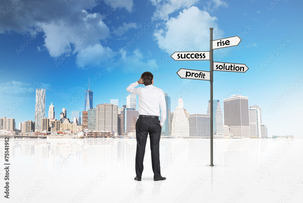 businessman standing and looking to city businessman standing and looking to city