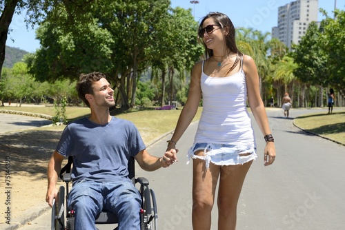 man in wheelchair and girlfriend