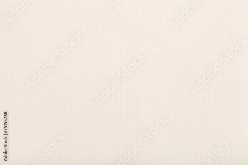 background from cream-coloured pastel paper photo