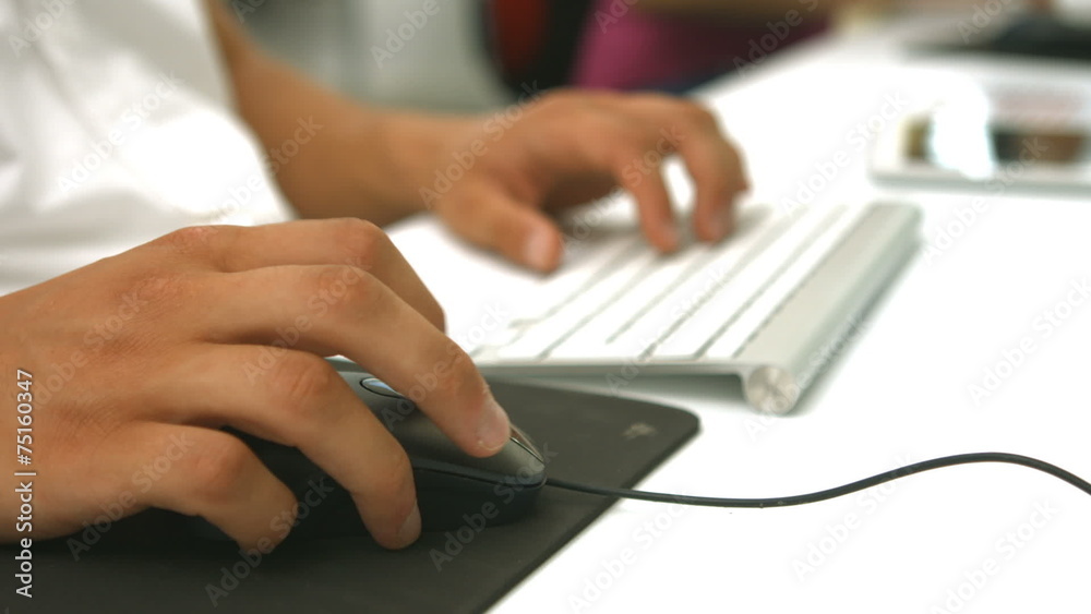 Student using computer in classroom Student using computer in classroom