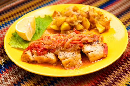 the peach fish with sauce and vegetable