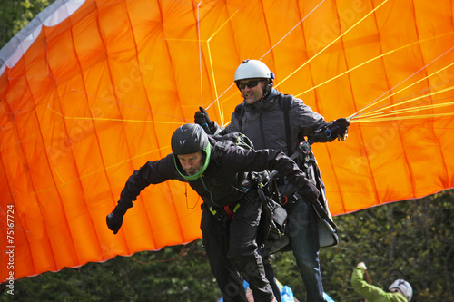Tandem Paraglider launching