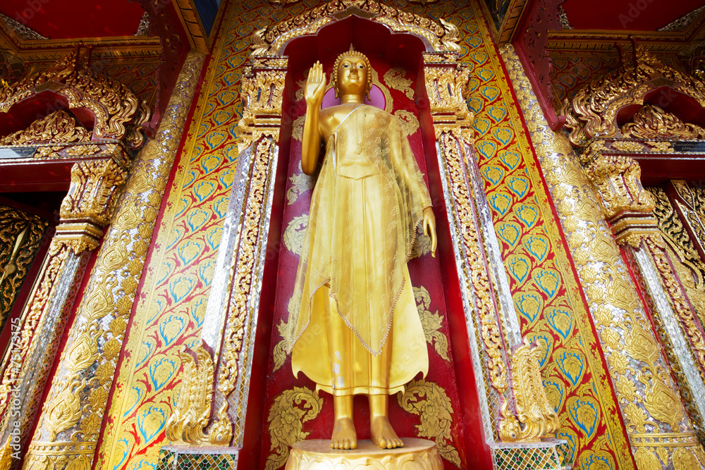 Golden Buddha statue in temple ,Thailand