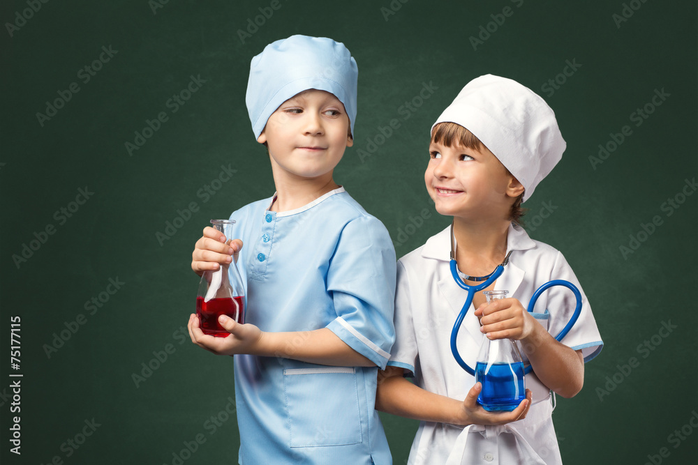 Couple of young doctors in studio Couple of young doctors in studio