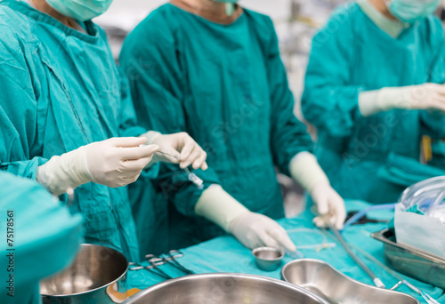 scrub nurse team prepare instruments for open heart surgery