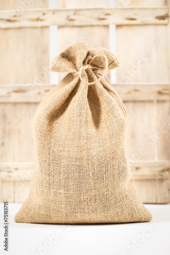 Coffee bag in front of old wooden box
