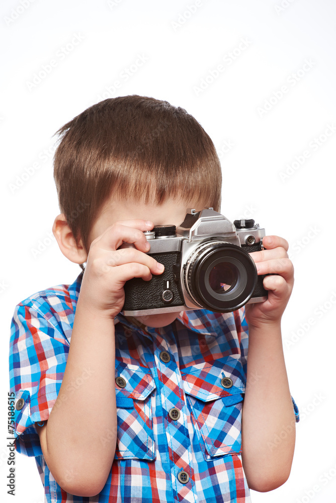 Little boy reporter photographer shooting with SLR camera isolat Little boy reporter photographer shooting with SLR camera isolat