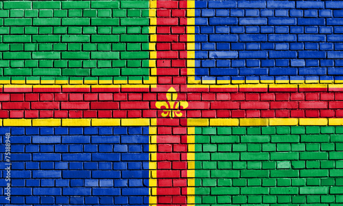 flag of Lincolnshire painted on brick wall photo