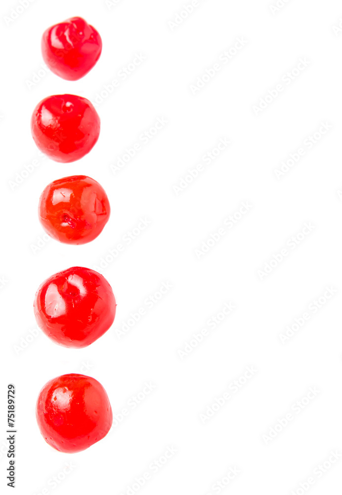 Pickled cherry fruit over white background