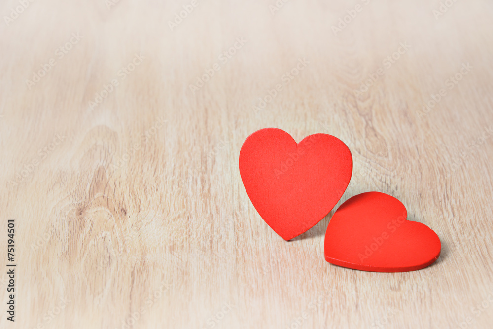 Fototapeta premium Red hearts on wooden background