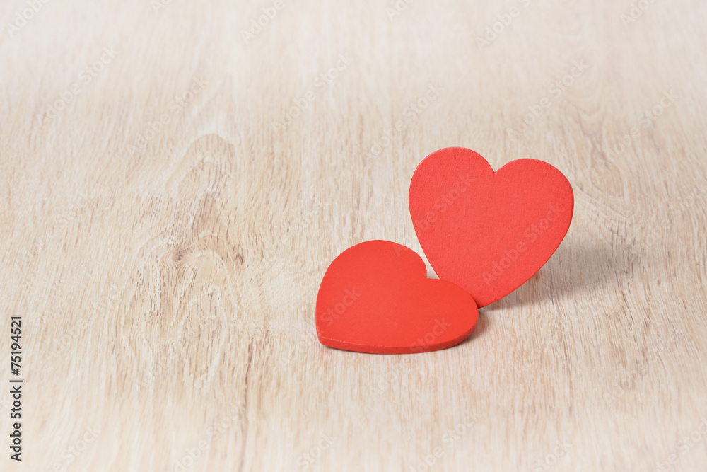 Fototapeta premium Red hearts on wooden background