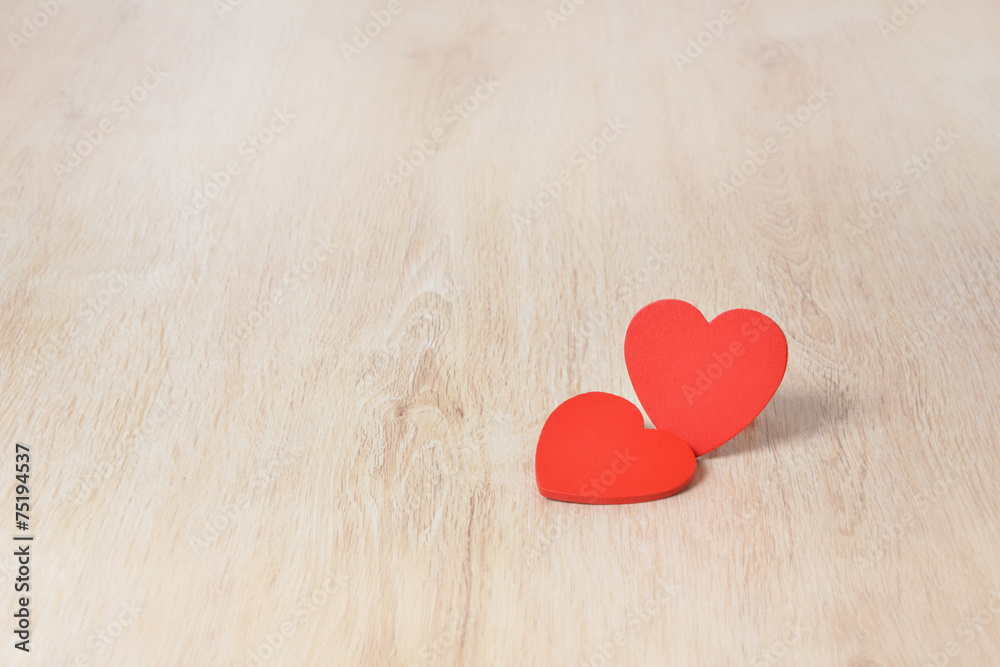 Fototapeta premium Red hearts on wooden background