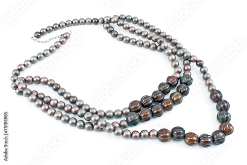 Necklace with gray beads isolated on white