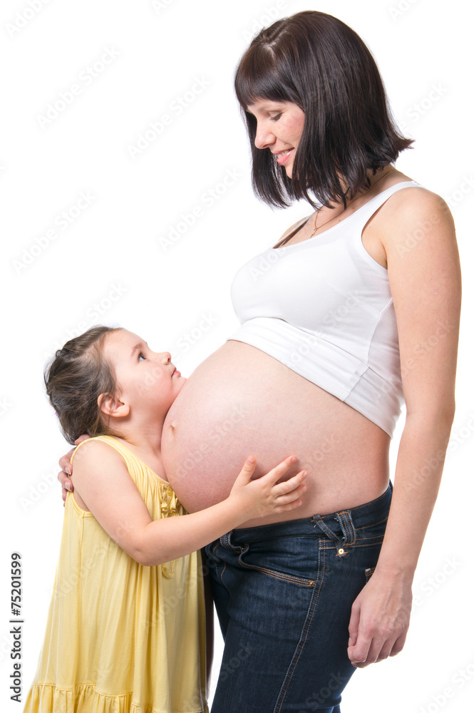 Pregnant mother and little daughter over white Pregnant mother and little daughter over white