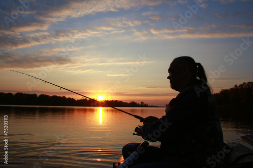 Portrait of a man in profile in a boat