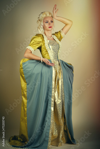 Haughty queen in royal dress