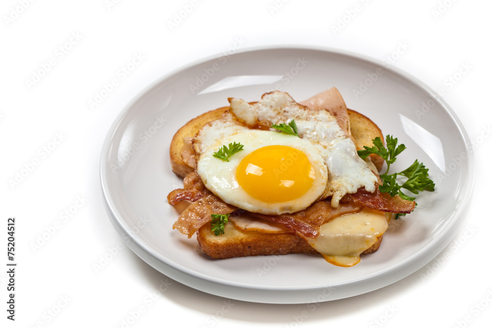 Traditional French Toasted Sandwich with fried eggs Traditional French Toasted Sandwich with fried eggs