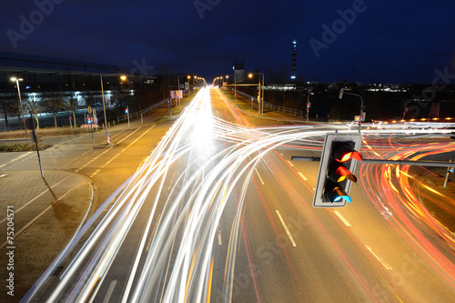 car light trails on the brisk intersection