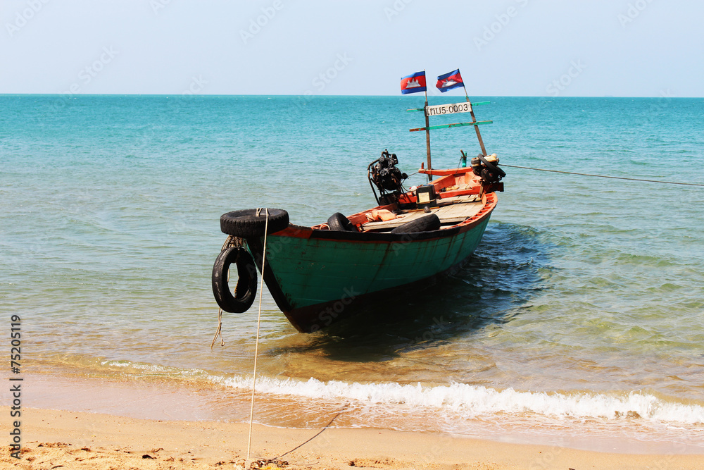 fisher boat near ocean beach