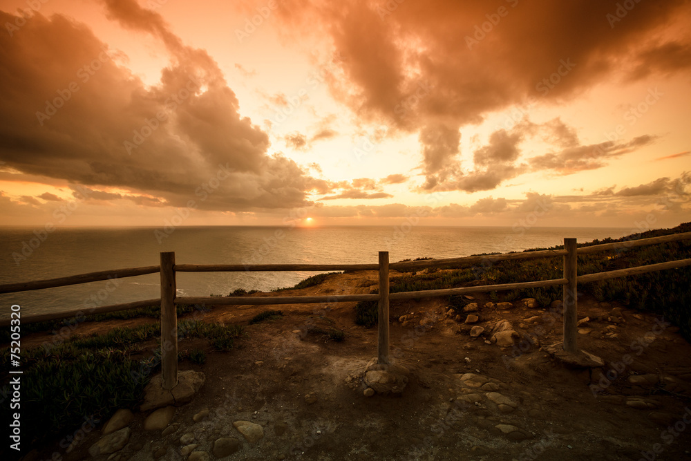 Wooden fence on the edge of Europe. Sunset. tinted Wooden fence on the edge of Europe. Sunset. tinted