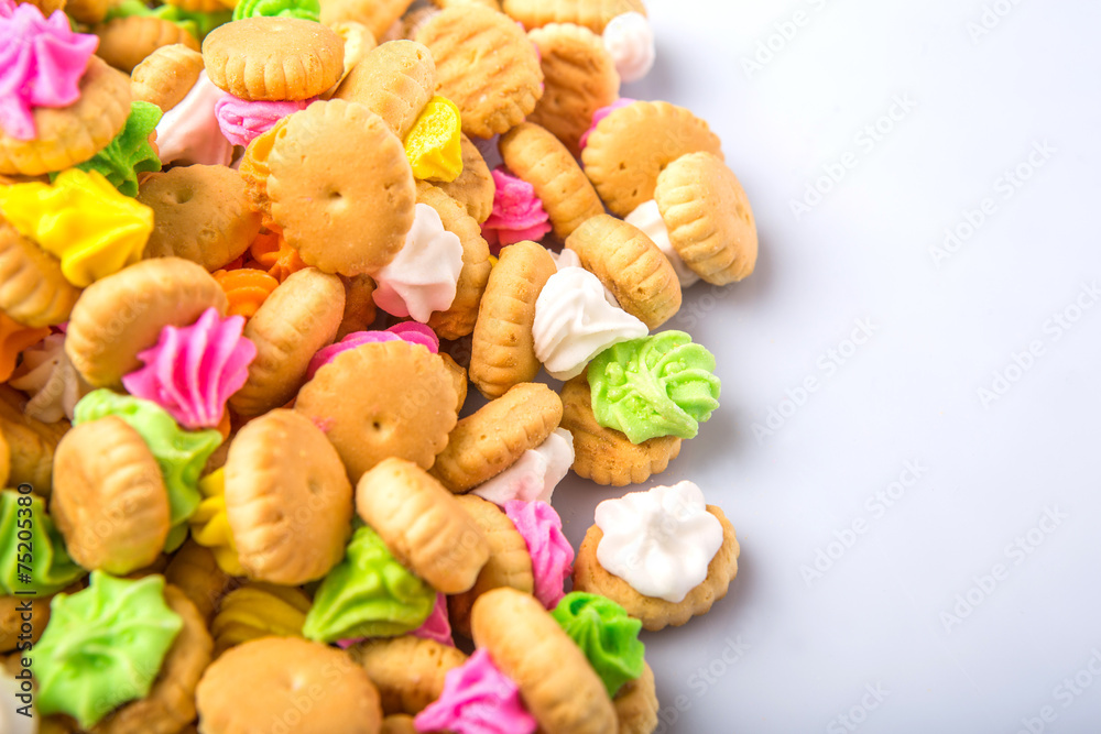 Belly button iced gem biscuits over white background