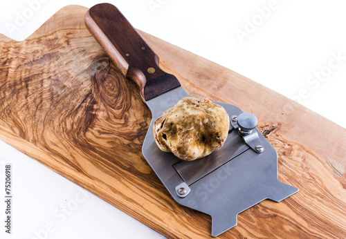 expensive white truffle from Alba and steel slicer