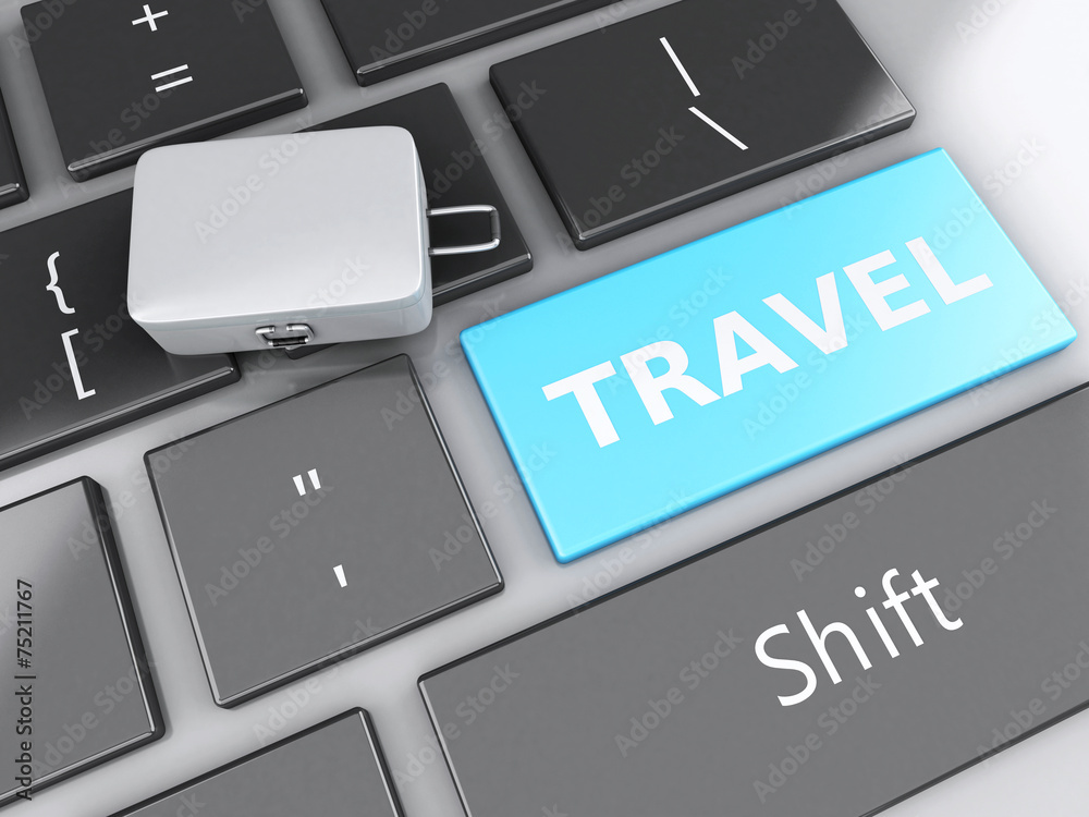 Fototapeta premium travel suitcase on computer keyboard. Travel concept