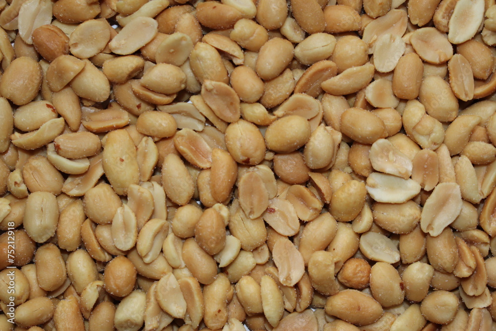 Scattered roasted and salted peanuts Scattered roasted and salted peanuts