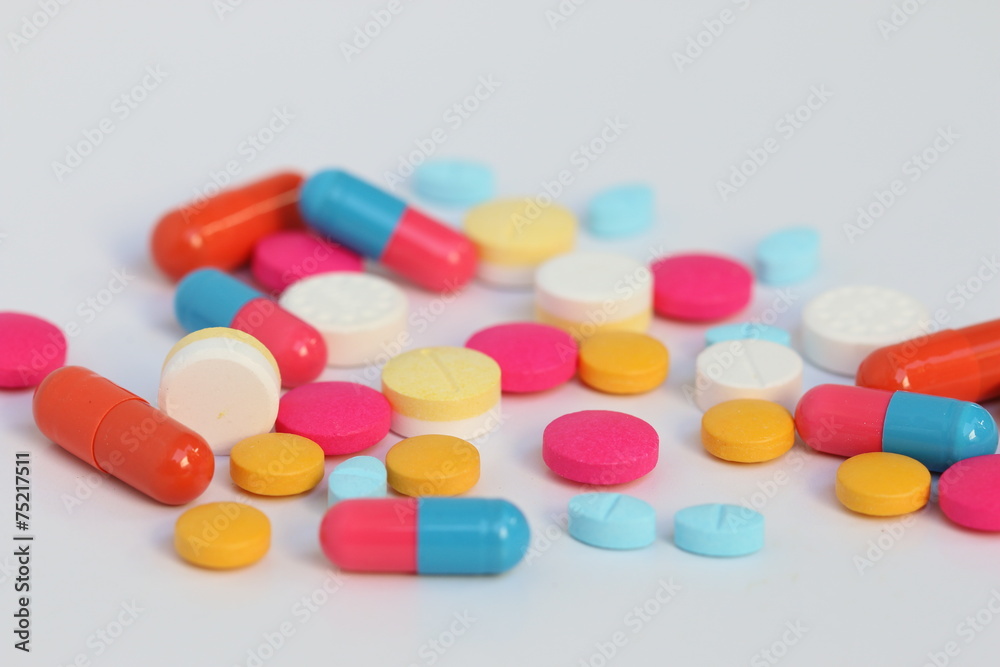 Spilled pills of drug or alimentary supplement.. Spilled pills of drug or alimentary supplement..