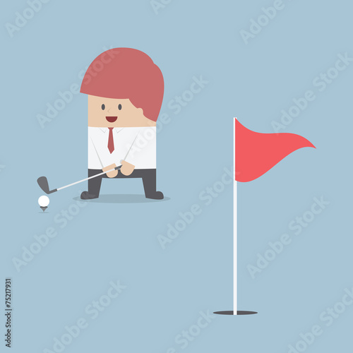 Businessman playing Golf