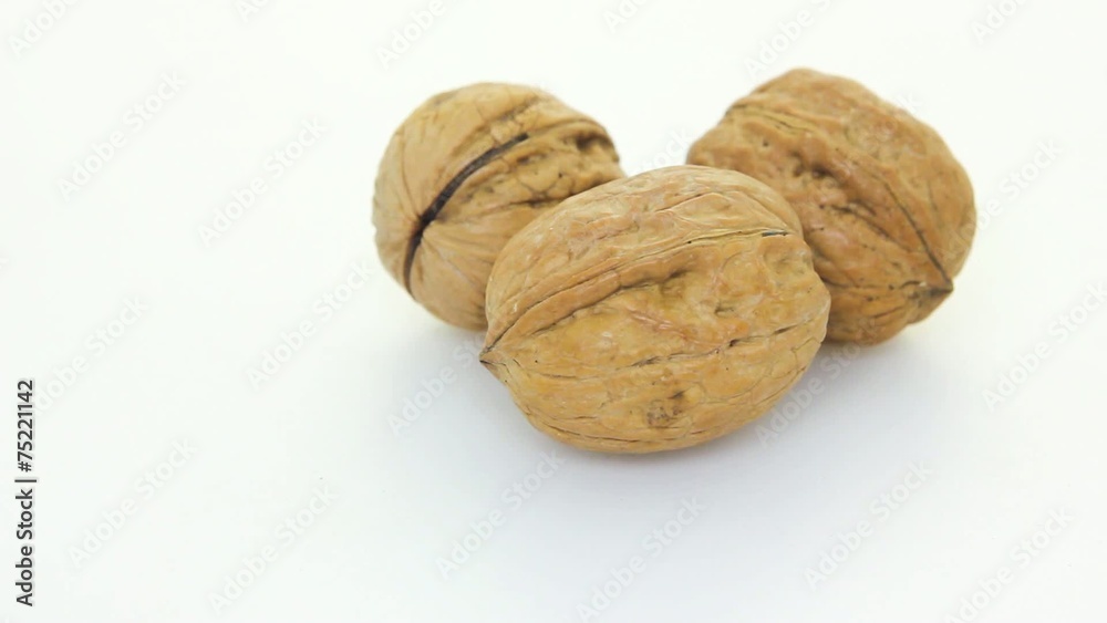 Three walnuts with white background Three walnuts with white background
