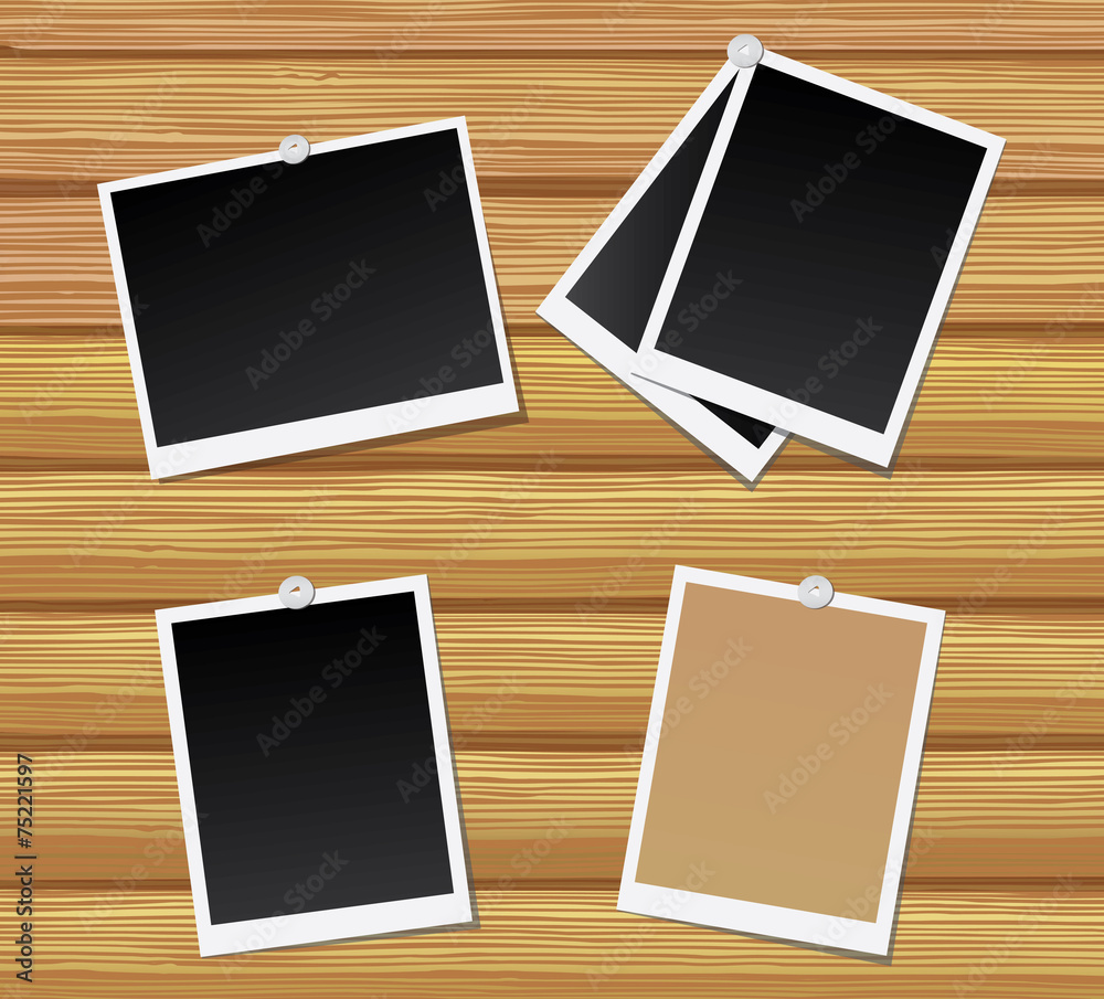 Blank photos on a wooden wall. Blank photos on a wooden wall.