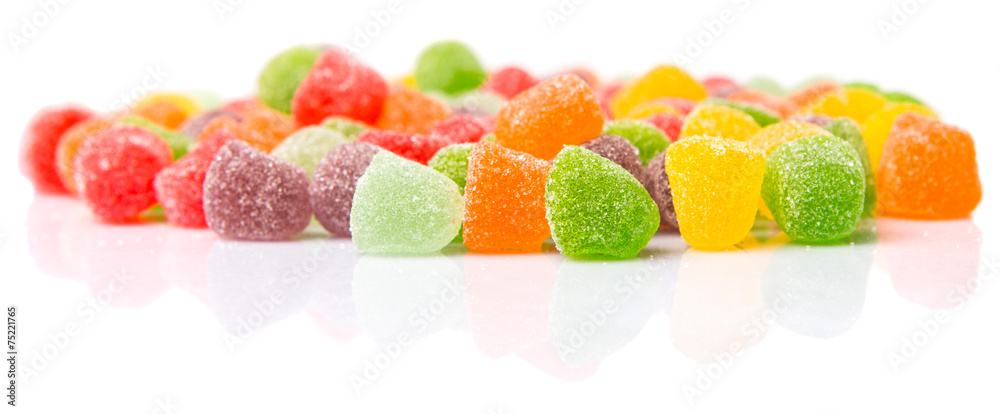 Colorful mix sugar jelly candy over white background Colorful mix sugar jelly candy over white background