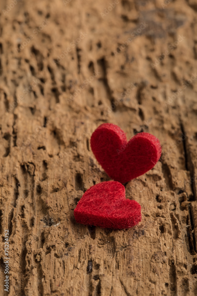 Fototapeta premium hearts on wooden surface