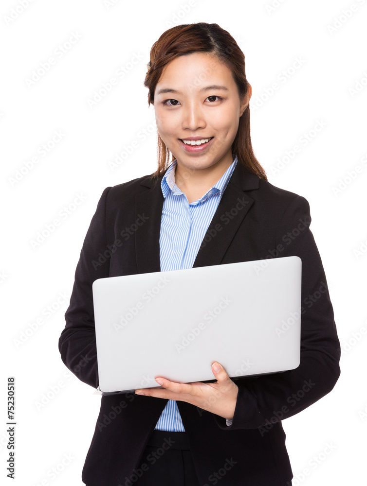 Businesswoman use of notebook computer Businesswoman use of notebook computer