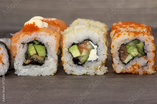 sushi on wooden background