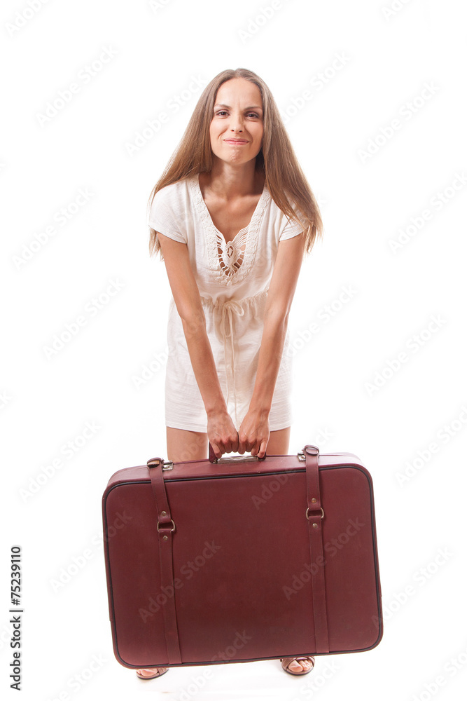Girl standing with suitcase. Isolated on white Girl standing with suitcase. Isolated on white