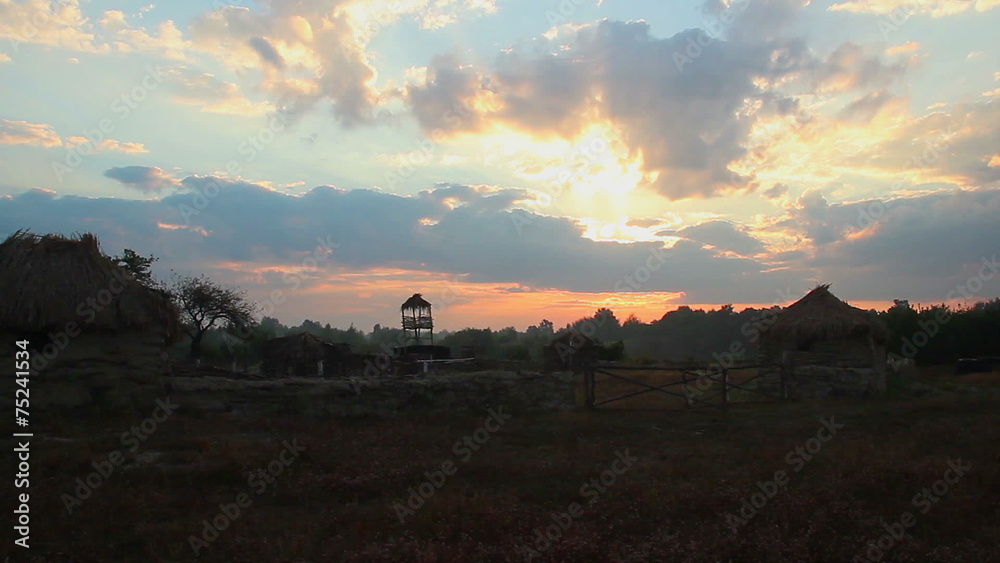 Time-lapse, sky above old farm in countryside. Beautiful sunrise Time-lapse, sky above old farm in countryside. Beautiful sunrise