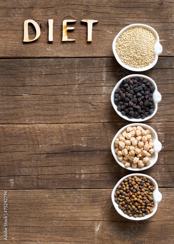 Cereals and legumes in bowls and word Diet