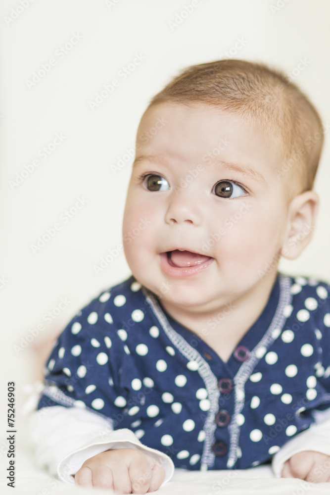 Natural Portrait of Positive Caucasian Newborn Girl Natural Portrait of Positive Caucasian Newborn Girl