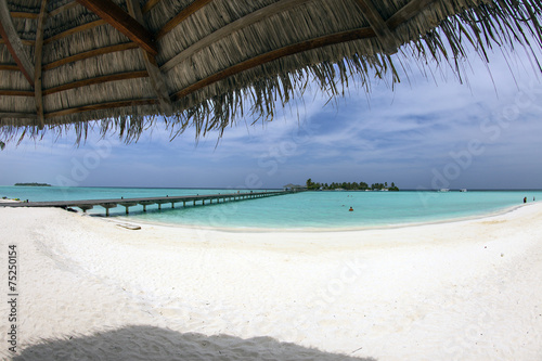 Fototapeta Naklejka Na Ścianę i Meble -  Maldive, sotto l'ombrellone