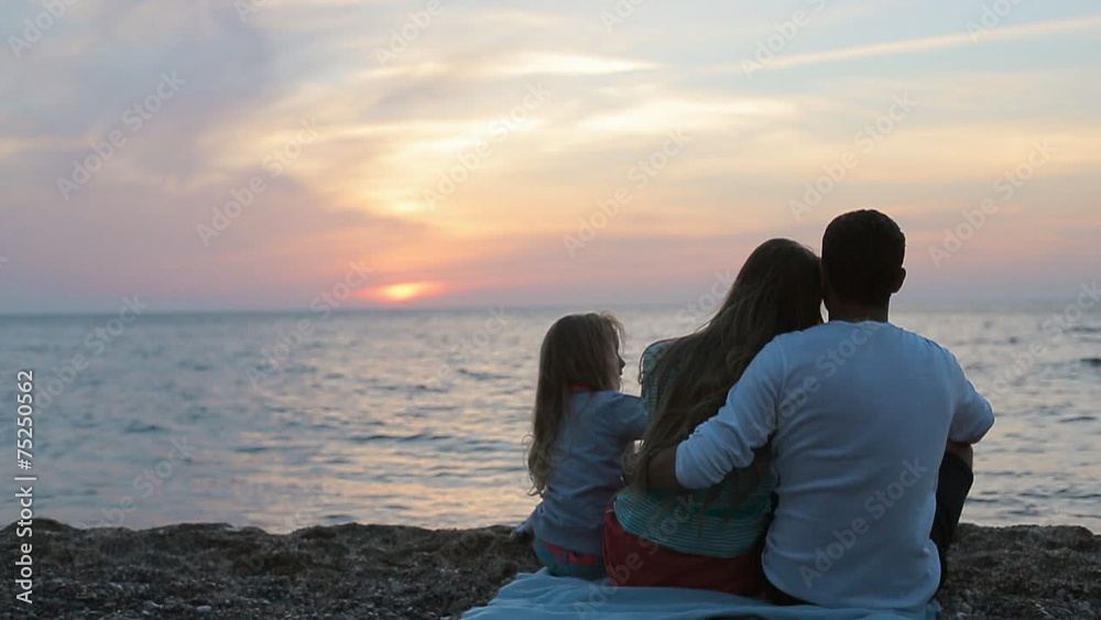 Full of love family enjoy magnificent sunset on the beach Full of love family enjoy magnificent sunset on the beach