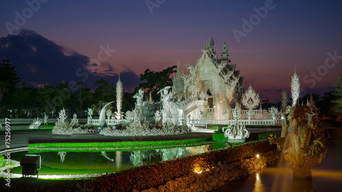 Wat Rong Khun (White temple) at twilight time