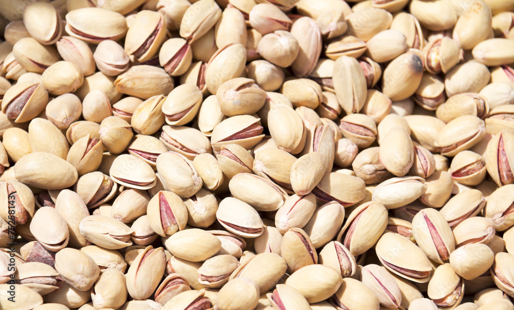 Close up of fresh pistachios. Whole background. Close up of fresh pistachios. Whole background.