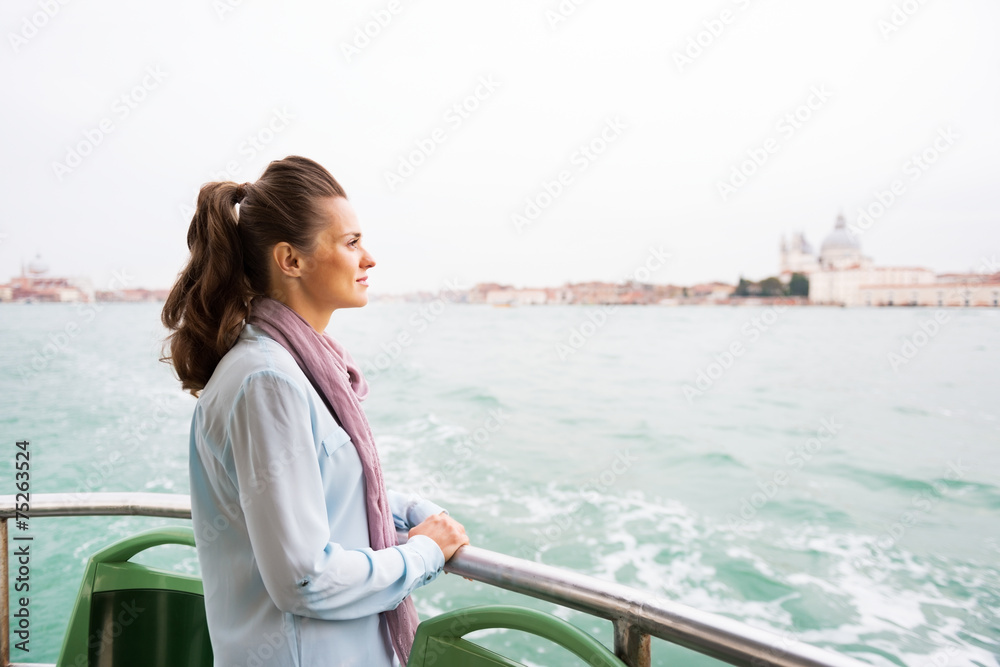 Young woman travel by vaporetto in venice, italy Young woman travel by vaporetto in venice, italy
