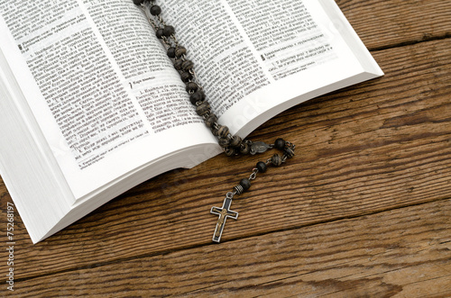 Open Bible with rosary
