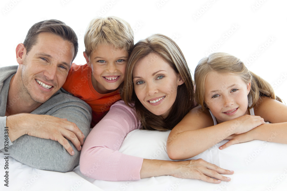 Portrait of a happy young family with two children