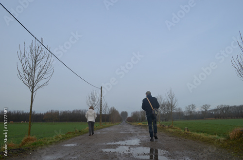 man walking in countryside